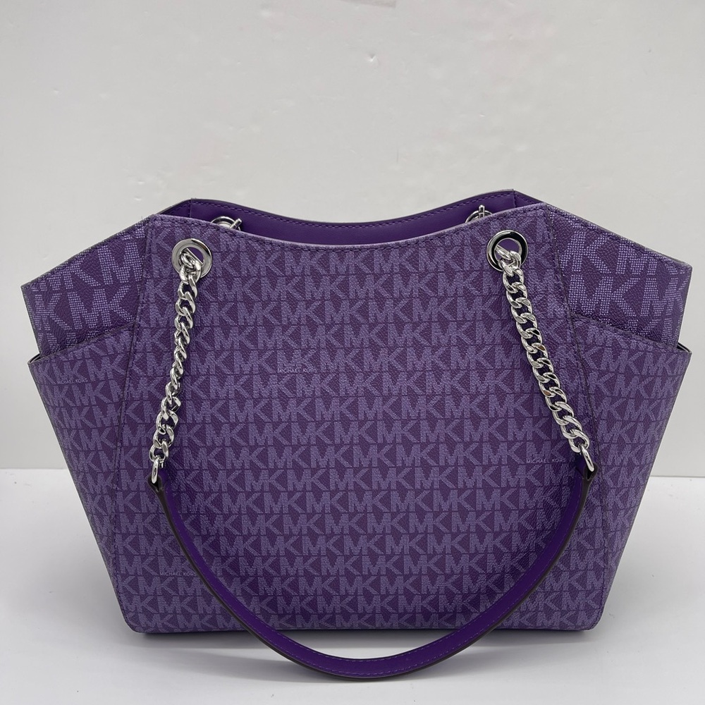 MICHAEL KORS
Jet Set Travel Lg Signature Chain Shoulder Tote
Dark Purple
NWT - Picture 8 of 16